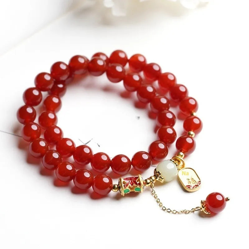 Women's red agate and Hetian jade bracelet with gold plating in original design