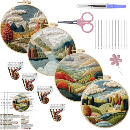 Complete DIY embroidery kit with 15cm bamboo frame, pre-printed landscape fabric, threads, and needles laid out.