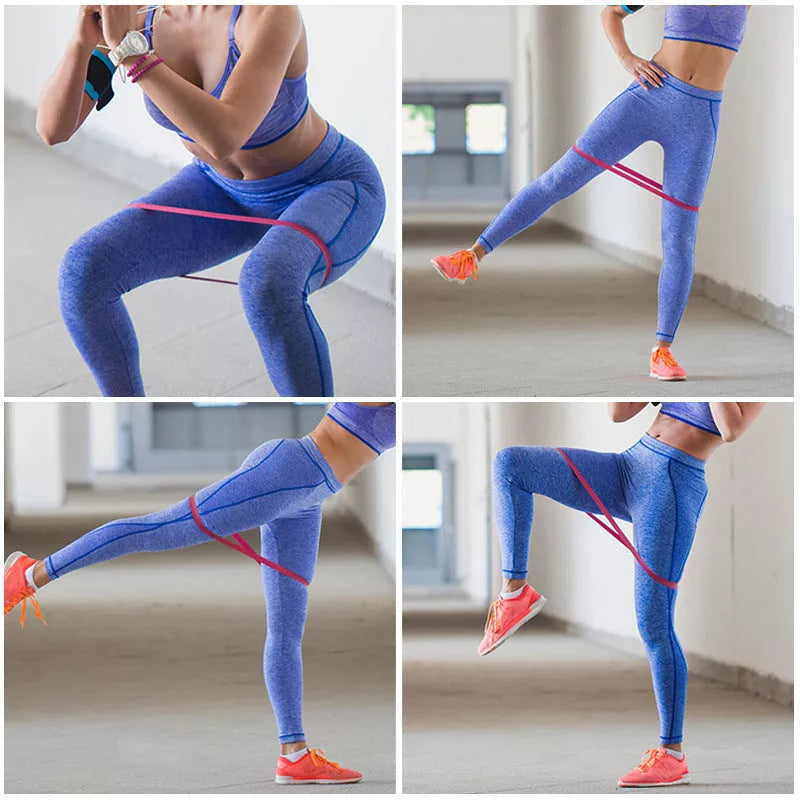 Yoga tension band set in five colours with varying resistance levels for fitness and Pilates