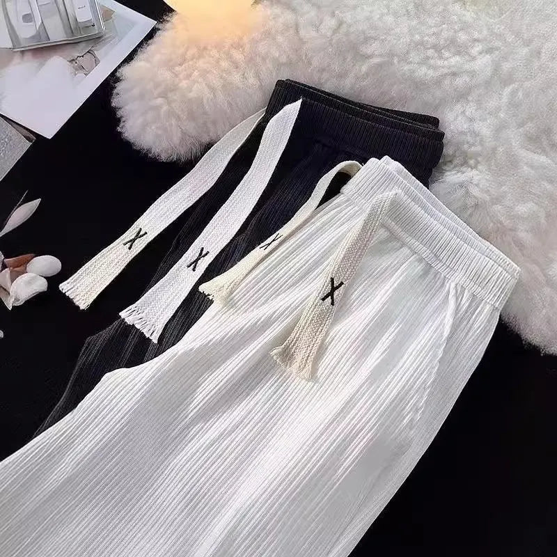 Men's cotton casual trousers with ice silk thread in loose straight cut, white or black colour options