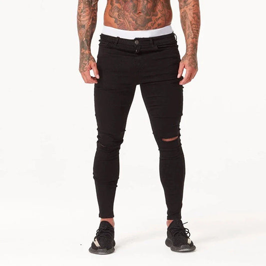 Trendy distressed black skinny jeans for men, featuring a super-elastic cotton construction and edgy, lived-in look