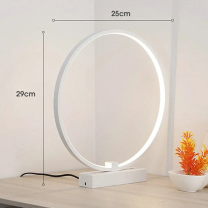 Modern 25cm diameter white LED bedside lamp with acrylic frame and iron base, emitting cool or warm white flicker-free light
