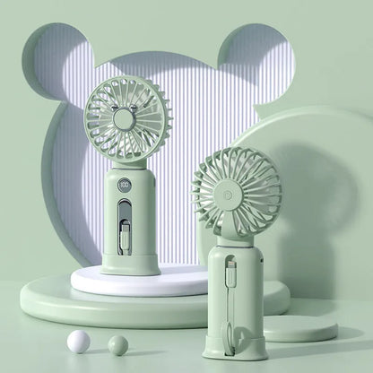 Purple handheld USB fan with power bank ports, shown with a white USB cable.