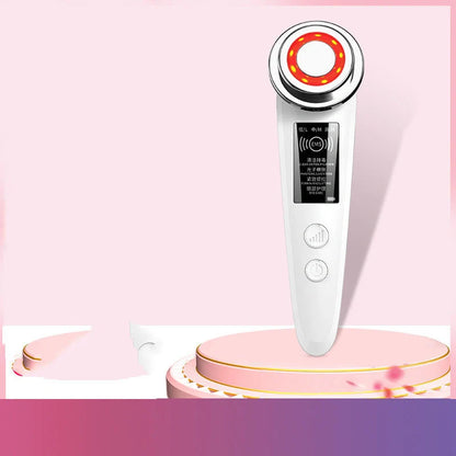 Pink and white facial massager with light therapy and pore cleansing features