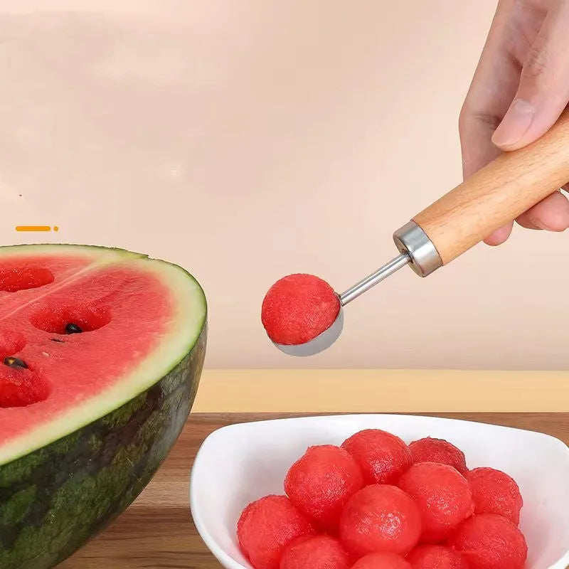 Stainless steel watermelon cutting tools with wooden handles including fruit knife, carving knife and ball cutter