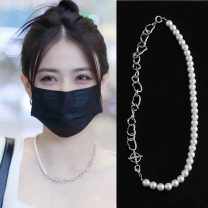 White geometric acrylic clavicle chain necklace with asymmetric design and twisted chain style