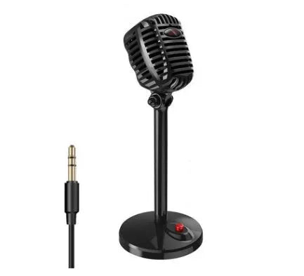 Black USB computer microphone with adjustable gooseneck and weighted silicone base stand on a desk.