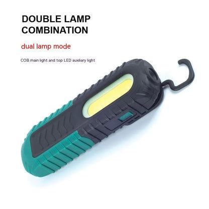 Black and green auto repair work light with USB charging cable for vehicle inspections