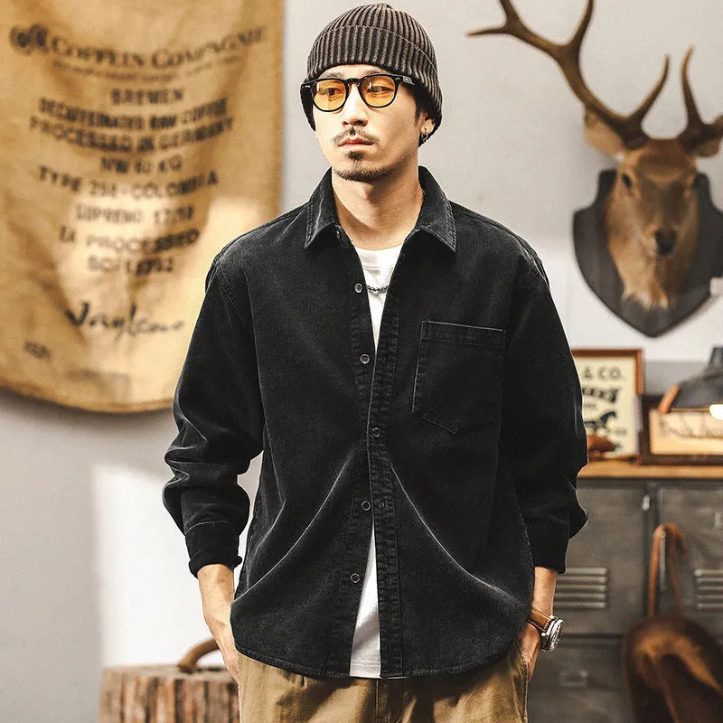Men's red corduroy loose-fit shirt jacket with long sleeves, showing front view.