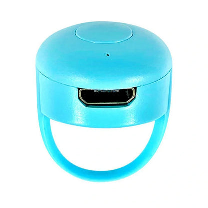 Bluetooth remote control ring for mobile phones in yellow, blue, and pink