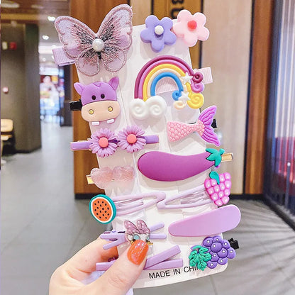 Assortment of colourful toddler hair clips and barrettes with candy, rainbow, fruit, and butterfly designs