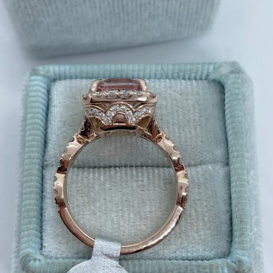 Rose gold geometric alloy ring showing electroplated finish and structured shape.