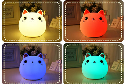 White silicone cat LED lamp with warm glow, measuring 12.5cm tall with USB charging port