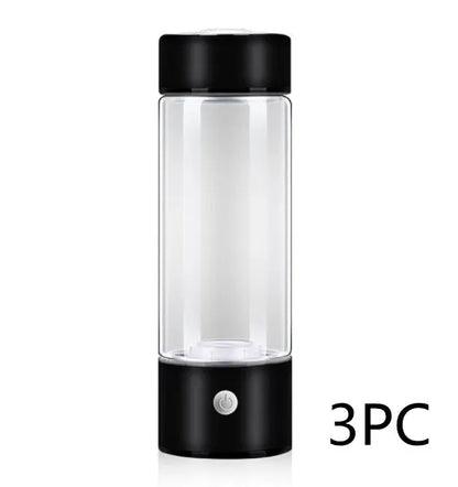Portable hydrogen water bottle with glass chamber and stainless steel components showing electrolysis bubbles