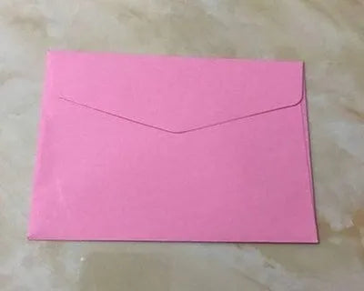 Mini coloured paper envelopes in various hues measuring 11.5 by 8 centimetres