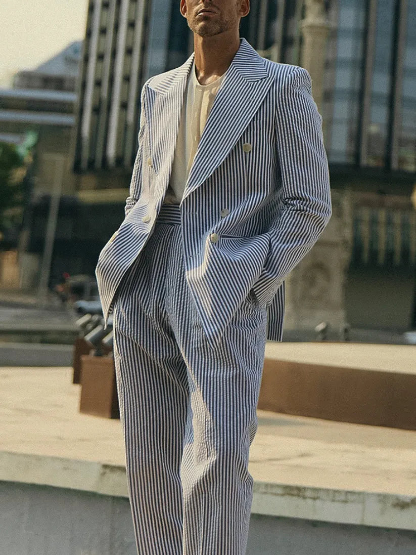 Blue and white striped two-piece suit set with matching blazer and trousers