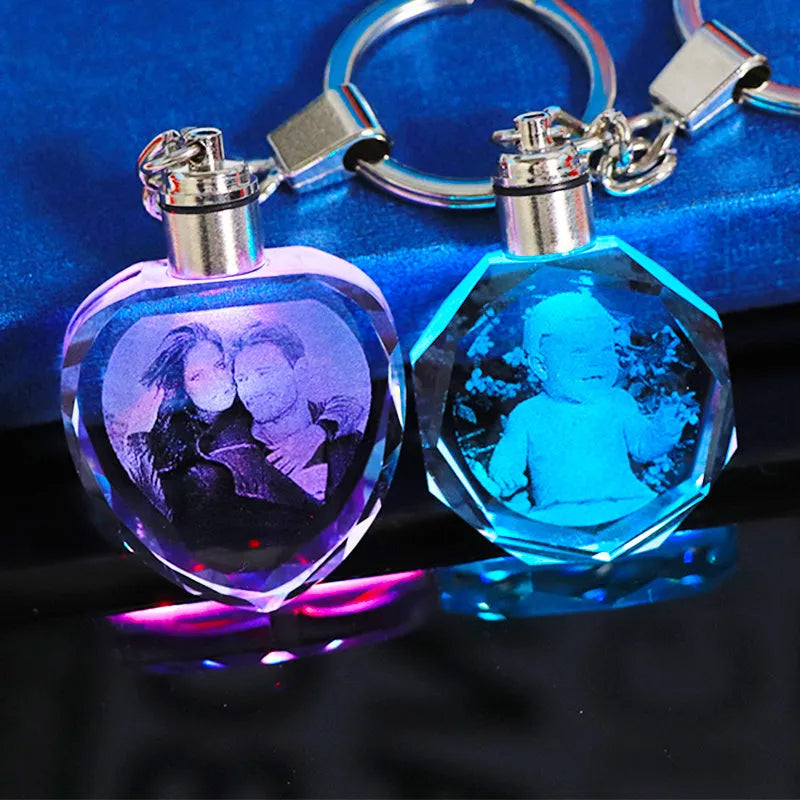Custom laser-etched crystal photo keychain with internal colourful LED light activated, showing a personalised image.