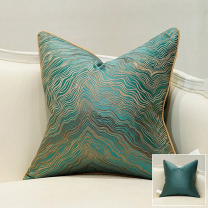 Corrugated stripe and diamond pattern cushion covers in green, blue, grey, and beige colours.
