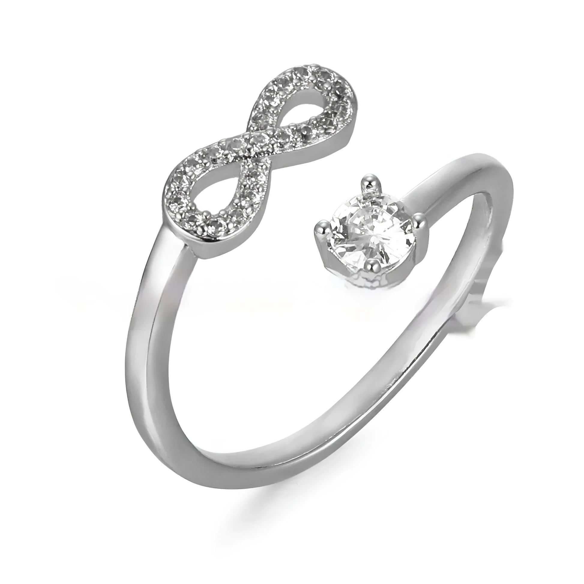 Open geometric ring with a zircon-encrusted letter 'A' in rose gold on a finger.