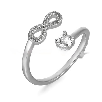 Open geometric ring with a zircon-encrusted letter 'A' in rose gold on a finger.