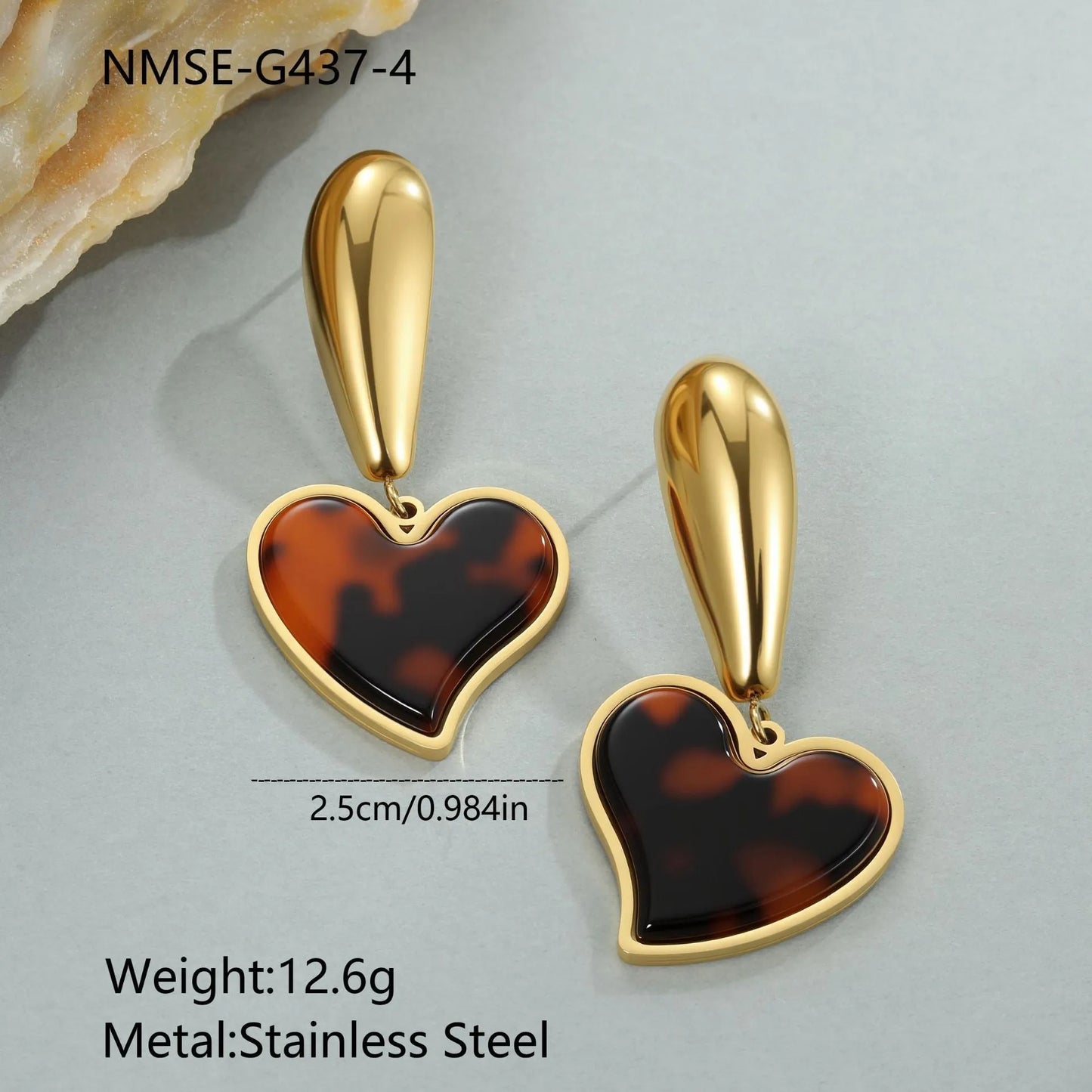 Women's tortoiseshell resin style earrings with 18K gold electroplated finish on stainless steel, heart and floral designs