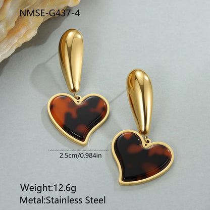 Women's tortoiseshell resin style earrings with 18K gold electroplated finish on stainless steel, heart and floral designs