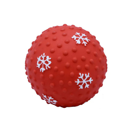 Red and green Christmas snowflake print dog chew ball with air vents, approx 7cm diameter.