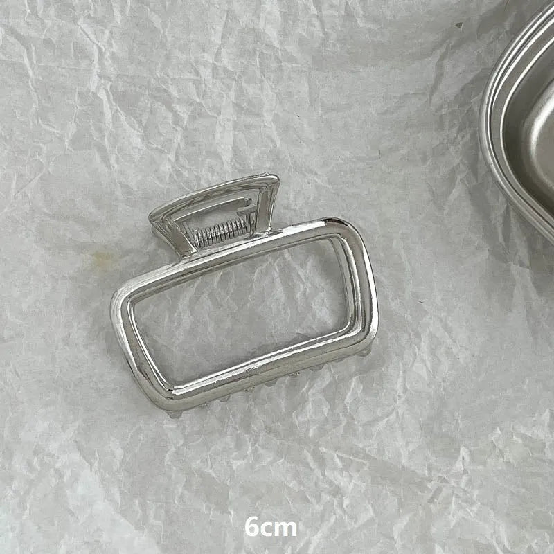 Silver metal hair claw barrette example from a range of 44 Korean-style designs.