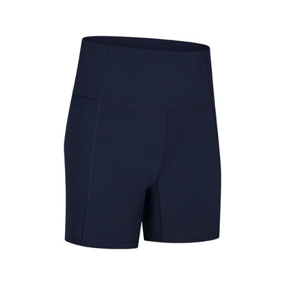 Women's tight-fitting cotton blend sports shorts in black, showing super stretch function and fifth pants length.