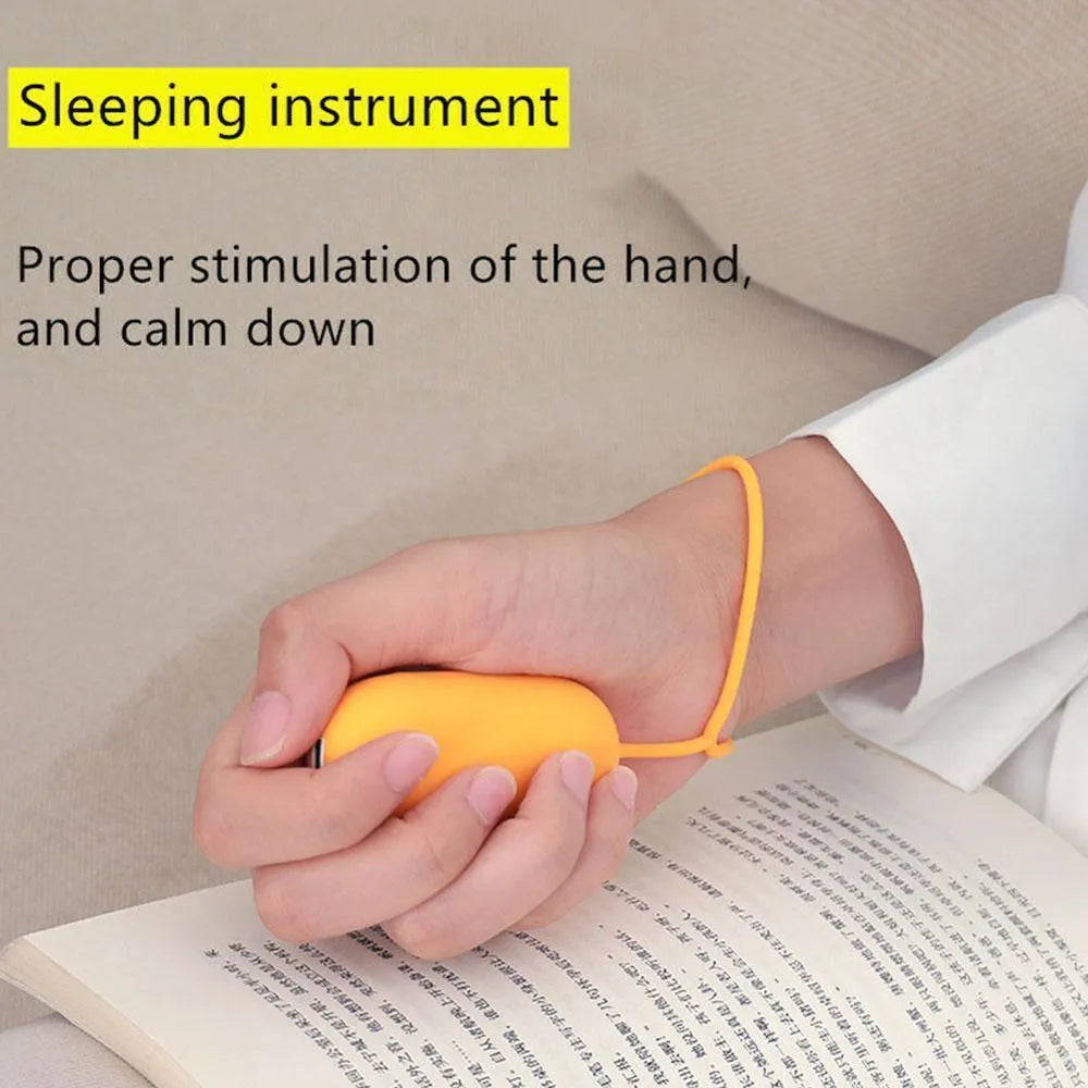Hand-held micro-current sleep aid device in grey, green, or orange with round button and USB charging port
