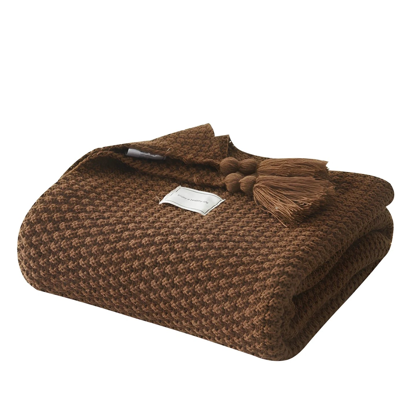 Fringed knitting blanket in beige colour showing 5cm fringe detailing and dense acrylic weave texture