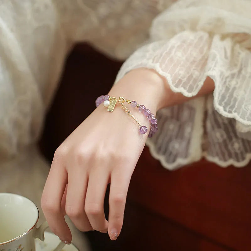 Women's natural lavender amethyst crystal bracelet in elegant design on wrist