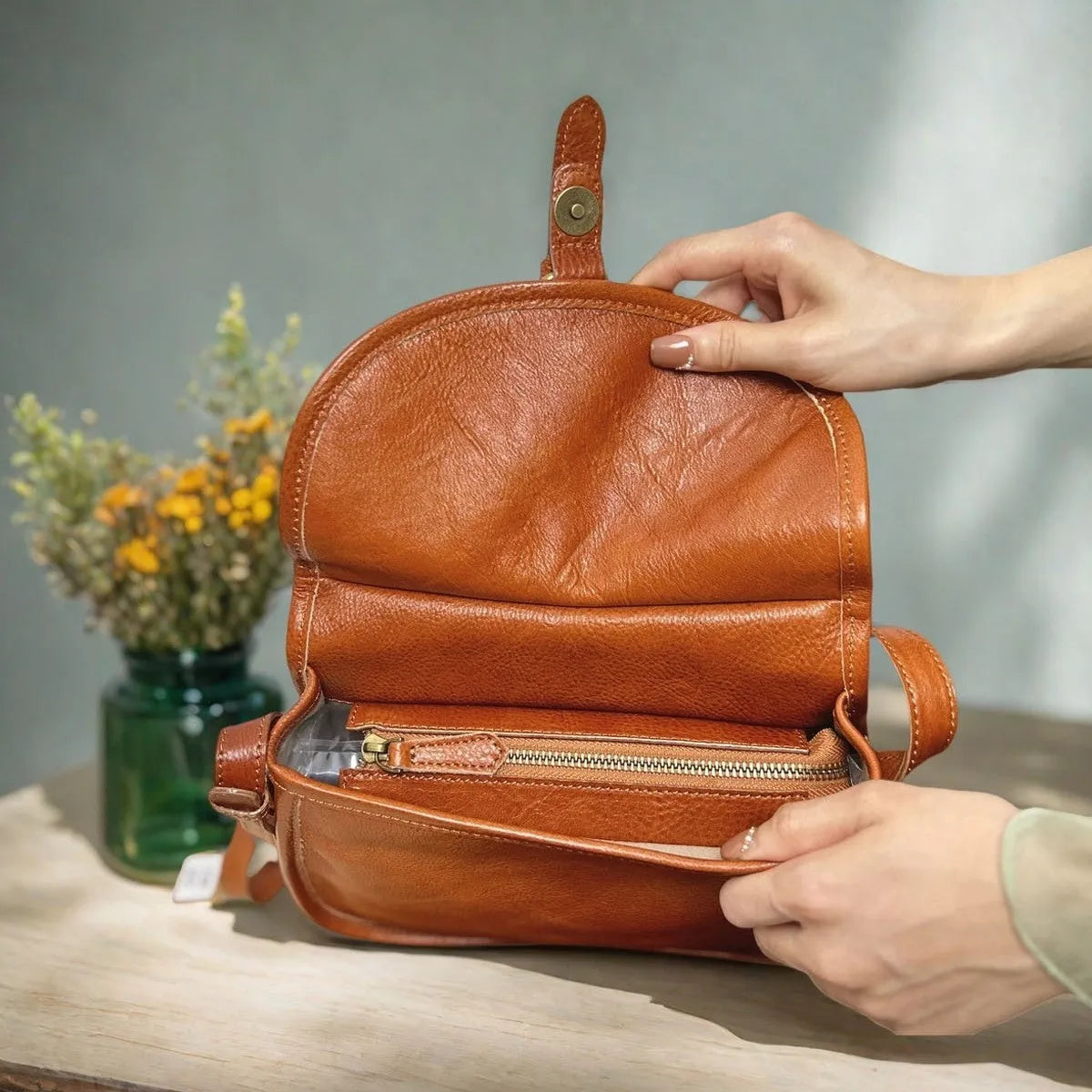 Genuine leather retro messenger bag with crossbody strap and flap closure in coffee colour