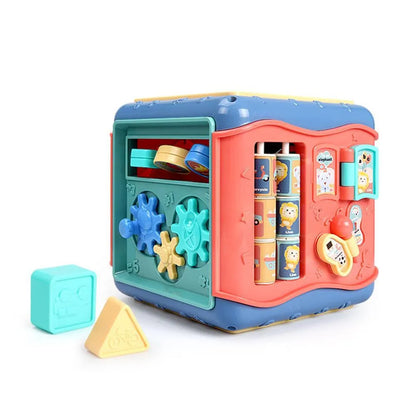 Colourful hexahedron educational toy with bead maze, gears, shape sorter, and clock face on different sides