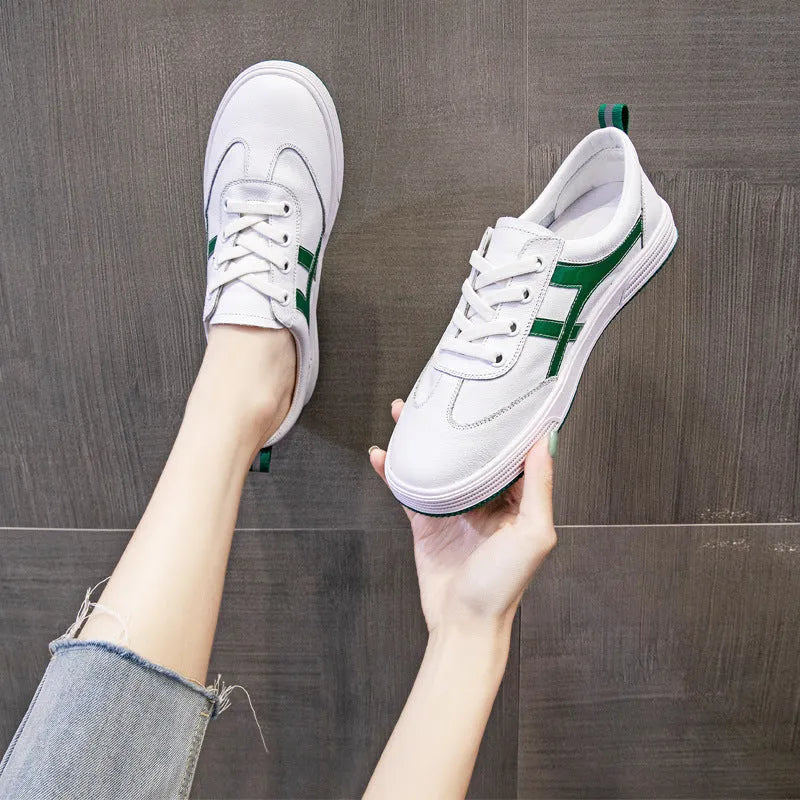 Cowhide leather casual sneakers with elastic band wearing in black or white colours, low top design with round toe