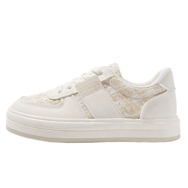 Beige and plaid patterned platform sports shoes with round toe and white rubber sole.