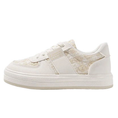 Beige and plaid patterned platform sports shoes with round toe and white rubber sole.