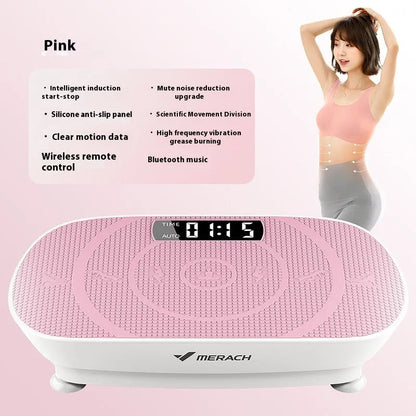 Grey portable vibration plate on a wooden floor, showing its slim 16cm profile and textured platform surface.