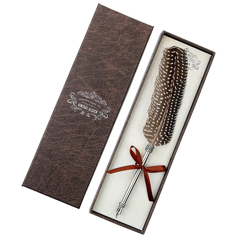 Elegant retro feather pen in a luxury gift box, featuring a sleek stainless steel casing and a stunning array of authentic feather designs.