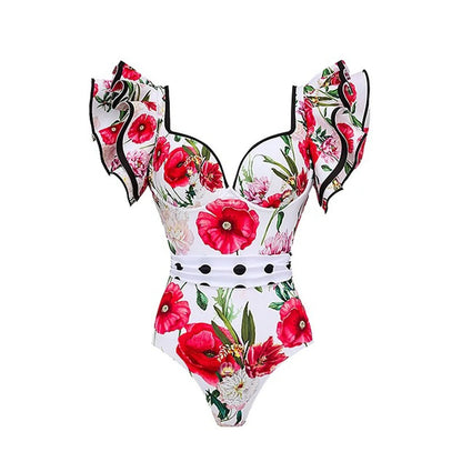 Women's printed one-piece swimsuit in rose pink on a mannequin.
