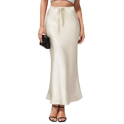 Asymmetric high waist acetate skirt with irregular stitching in multiple colour options.