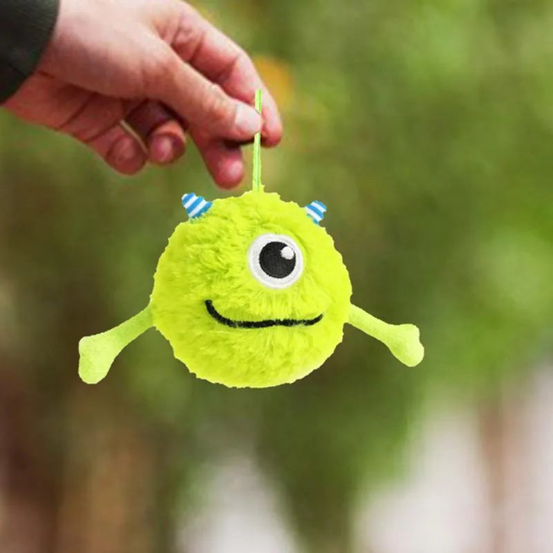 Green interactive dog ball toy with plush and TPR construction, 12cm diameter