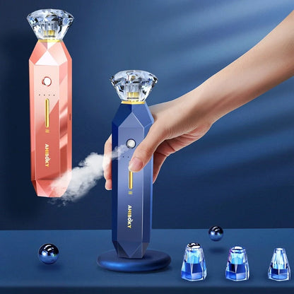 2-in-1 Blackhead Remover and Facial Sprayer in pink and sapphire blue