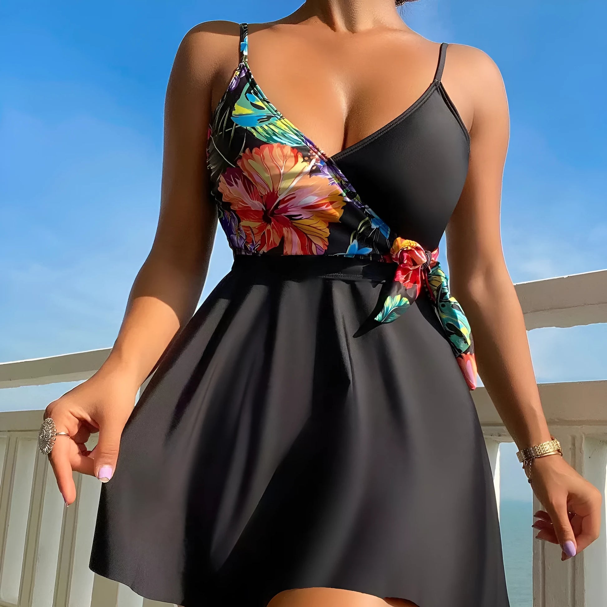 Black women's high waist briefs printed split leg bikini set for swimming and sports.