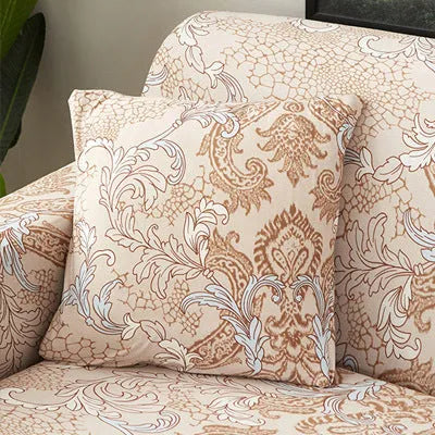 Printed stretchable sofa slipcover with geometric abstraction pattern on a three-seater sofa, showing tight fit and modern design.