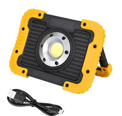 LED camping lantern with rotatable support showing USB ports and battery indicator