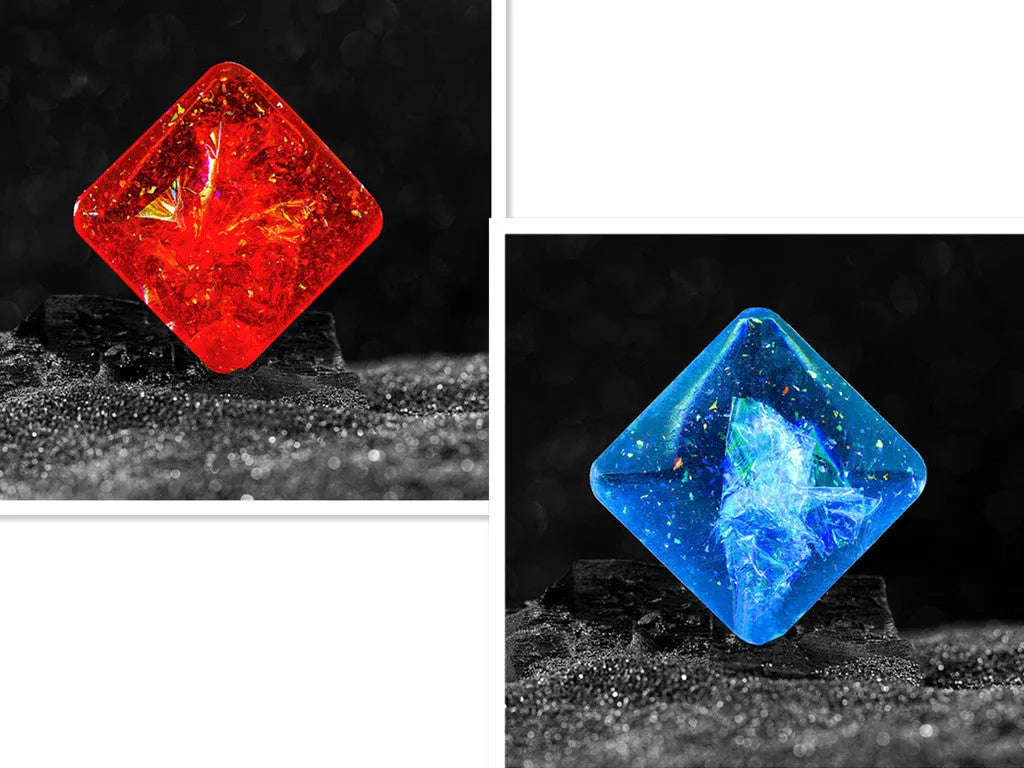 Galactic edition pocket gyro desk toy on a surface, showing its quadrilateral resin construction and celestial colour design.
