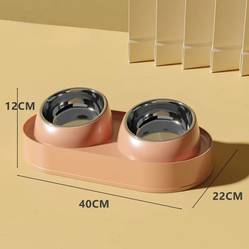 White elevated pet feeder with two tilted bowls on a non-slip base, for cat and small dog food and water.
