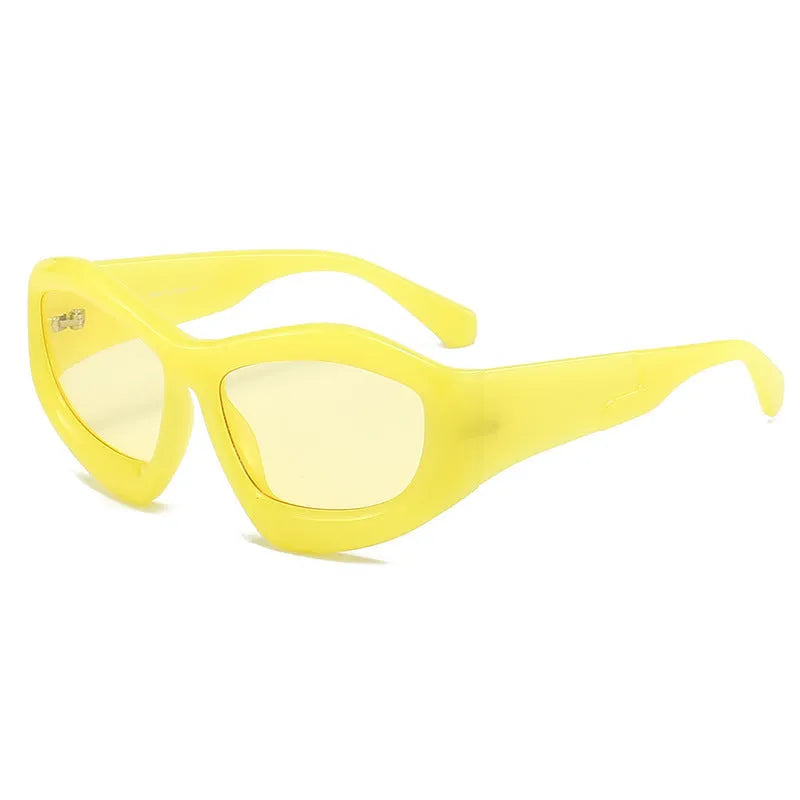 Outdoor unisex sunglasses with concave bubble lenses in black frame on a table.