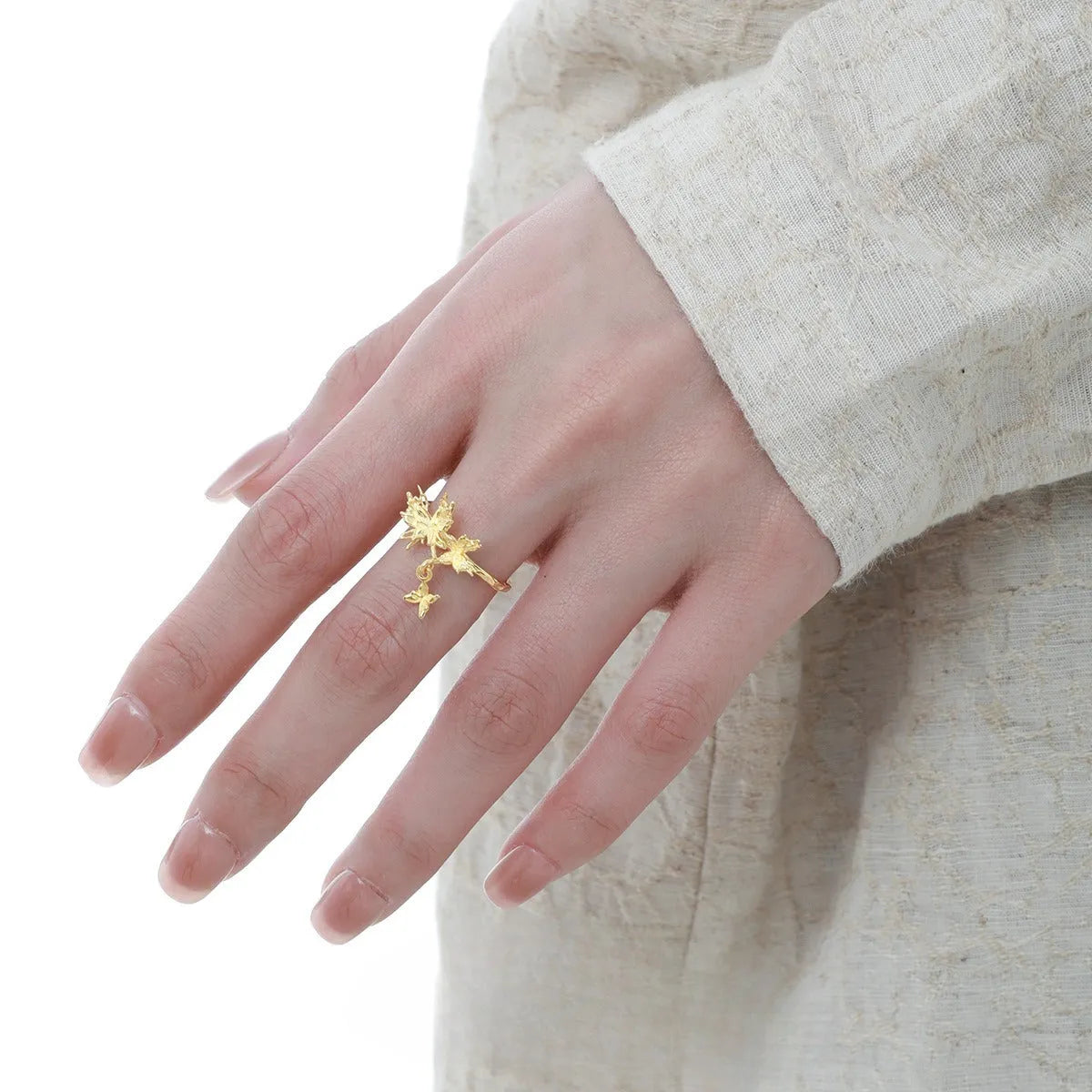 Adjustable open silver ring with a wild butterfly design in a choice of metallic finishes.